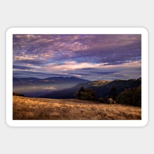 Sunset clouds over mountains Sticker